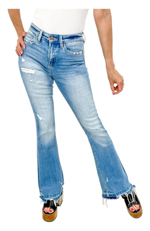 Distressed Flare Jeans In Blue